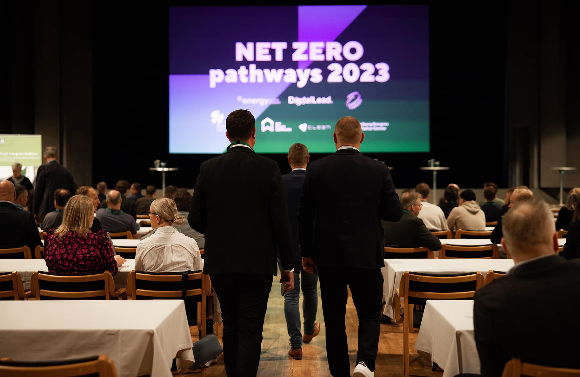Net Zero Pathways 2024 Event Conference Men Walking
