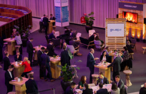 Many people at a conference with